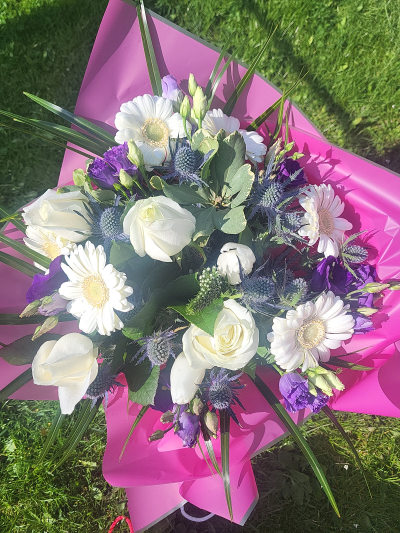 Cool Breeze - This classical stylish collection of flowers, make this hand tied the perfect gift. Flowers professionally arranged and delivered by a local florist.