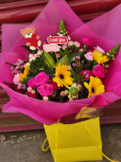 Mamma Mia - Make their day with this bright and vibrant collection of flowers, beautifully presented in a gift box / bag.